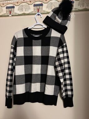Rachel Zoe black/white plaid design pullover rayon mix good condition size M